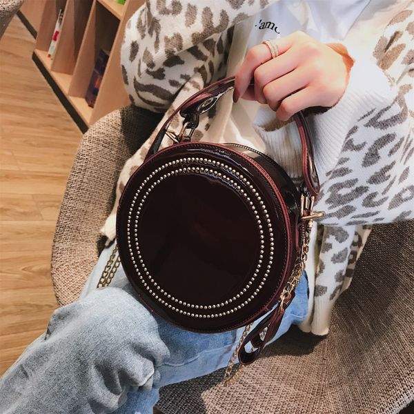 patent leather women small round bag fashion rivet tote handbags female casual shoulder crossbody bags bright bolsa
patent leather women small round bag fashion rivet tote handbags female casual shoulder crossbody bags bright bolsa