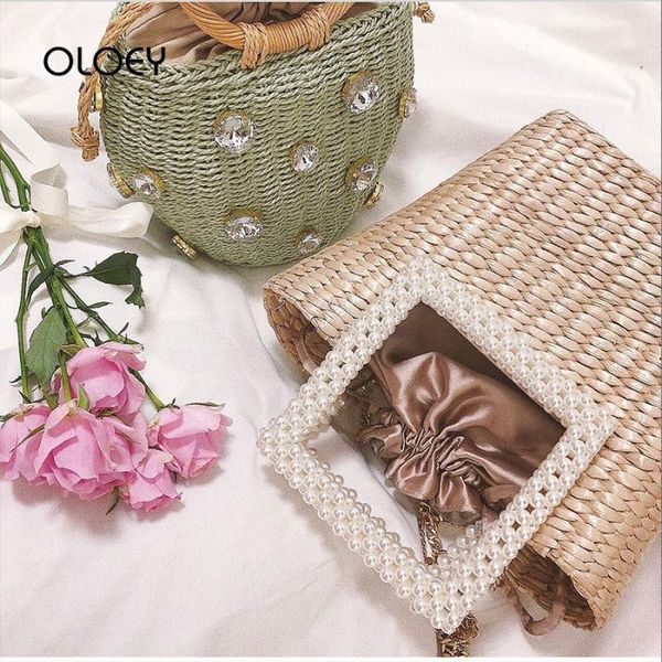 vintage handmade women rattan bag woven drawstring shoulder bags ins japanese imitation pearl straw bag summer beach handbags
vintage handmade women rattan bag woven drawstring shoulder bags ins japanese imitation pearl straw bag summer beach handbags