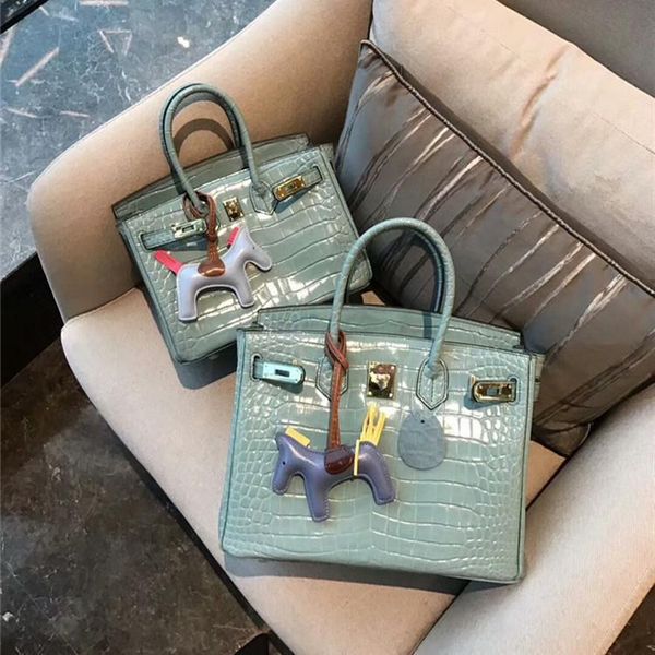 distinctive2019 crocodile grain cowhide temperament hand bill of lading shoulder span package ol genuine leather woman bag
distinctive2019 crocodile grain cowhide temperament hand bill of lading shoulder span package ol genuine leather woman bag