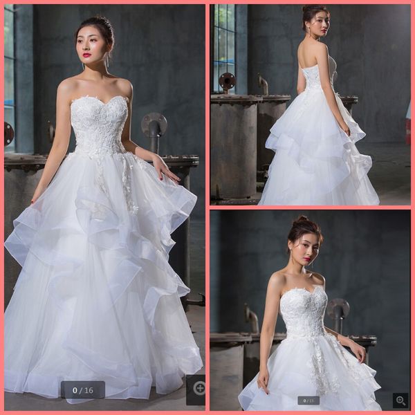 2020 new arrival white a line ruffled wedding dress lace appliques strapless sweetheart neck long bride dress corset wedding dresses
2020 new arrival white a line ruffled wedding dress lace appliques strapless sweetheart neck long bride dress corset wedding dresses