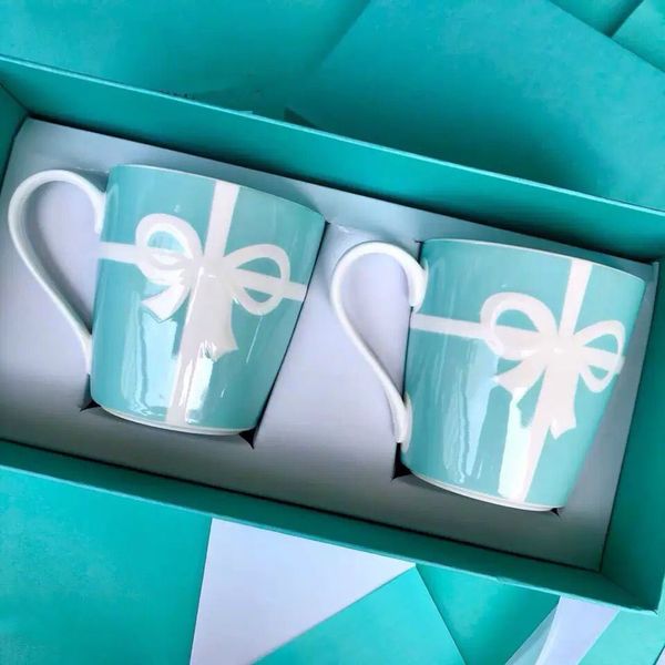 new fashion designer blue ti cup set of 2 cup with gift box, bow cup, coffee cup, suitable for office or family party gifts
new fashion designer blue ti cup set of 2 cup with gift box, bow cup, coffee cup, suitable for office or family party gifts