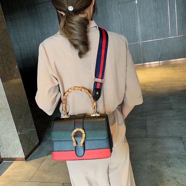 2020 new korean fashion wild personality contrast bamboo handbag oblique cross ladies wide shoulder strap small square bag
2020 new korean fashion wild personality contrast bamboo handbag oblique cross ladies wide shoulder strap small square bag