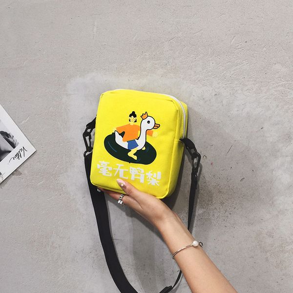 new candy-colored canvas schoolbag female shoulder cartoon printing simple female student oblique tide
new candy-colored canvas schoolbag female shoulder cartoon printing simple female student oblique tide