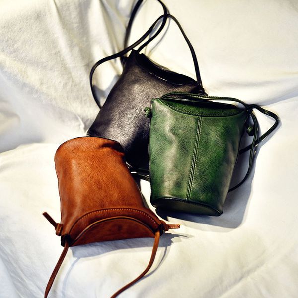 the new leather handmade vegetable tanned leather men and women bag simple retro messenger mini bucket bag
the new leather handmade vegetable tanned leather men and women bag simple retro messenger mini bucket bag