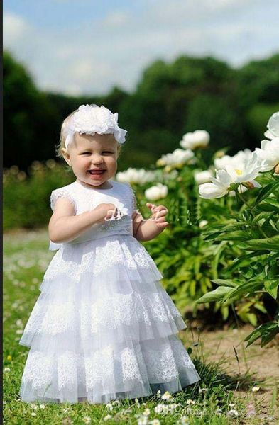 2019 designer white holy little girls dresses jewel neckline tiered skirt cap sleeves beaded belt lace girls party gowns, White;blue
2019 designer white holy little girls dresses jewel neckline tiered skirt cap sleeves beaded belt lace girls party gowns, White;blue