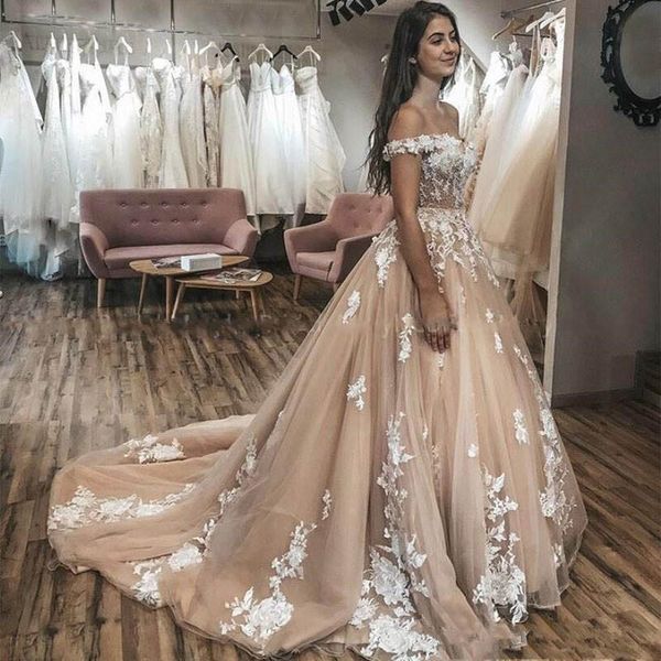 charming lace appliqued wedding dresses off the shoulder neck a line bridal gowns beaded sweep train tulle robe de mariée, White
charming lace appliqued wedding dresses off the shoulder neck a line bridal gowns beaded sweep train tulle robe de mariée, White