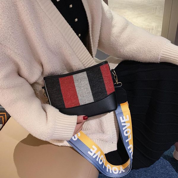 fashion women shoulder bag new wave korean contrast color canvas bucket bag stripes wide shoulder strap messenger
fashion women shoulder bag new wave korean contrast color canvas bucket bag stripes wide shoulder strap messenger