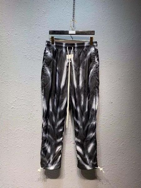 men digit print black and white jogger track pants 
men digit print black and white jogger track pants
