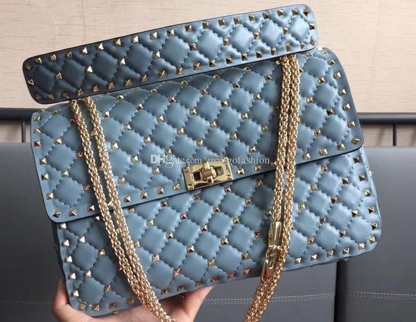 sell style imported first layer lambskin genuine leather eighteen color l siz with light gold rivet women cross shoulder bag
sell style imported first layer lambskin genuine leather eighteen color l siz with light gold rivet women cross shoulder bag