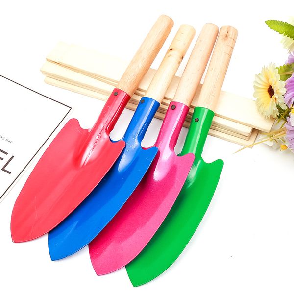 colorful mini iron garden shovel small gardening shovel kid plant spade with wooden handle home gardening tools
colorful mini iron garden shovel small gardening shovel kid plant spade with wooden handle home gardening tools