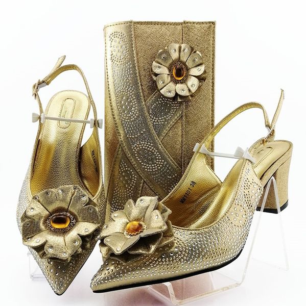 New fashion gold flower style women pumps with Big crystal decoration african dress shoes match handbag set MM1101,heel 7CM
New fashion gold flower style women pumps with Big crystal decoration african dress shoes match handbag set MM1101,heel 7CM