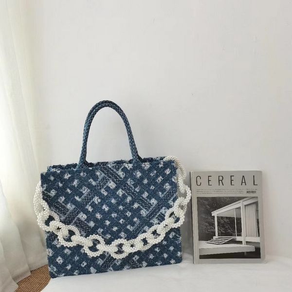 fashion simplicity bag female pearl short-distance travel handbag large capacity denim presbyopia niche personality small bag
fashion simplicity bag female pearl short-distance travel handbag large capacity denim presbyopia niche personality small bag