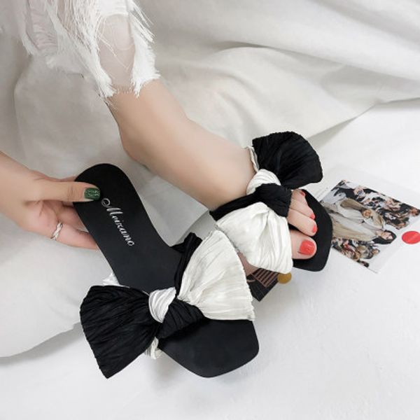simple bowknot slippers female 2020 new summer fashion wild open-toed personality student shoes non-slip female slippers, Black
simple bowknot slippers female 2020 new summer fashion wild open-toed personality student shoes non-slip female slippers, Black