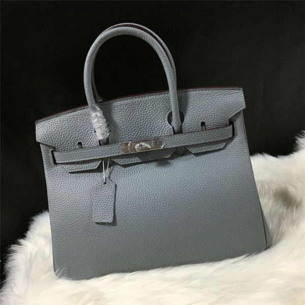 2020 designer bag elegant leather genuine woman bag kelly bag litchi grain head layer cowhide silver buckle single shoulder span handbag 25
2020 designer bag elegant leather genuine woman bag kelly bag litchi grain head layer cowhide silver buckle single shoulder span handbag 25