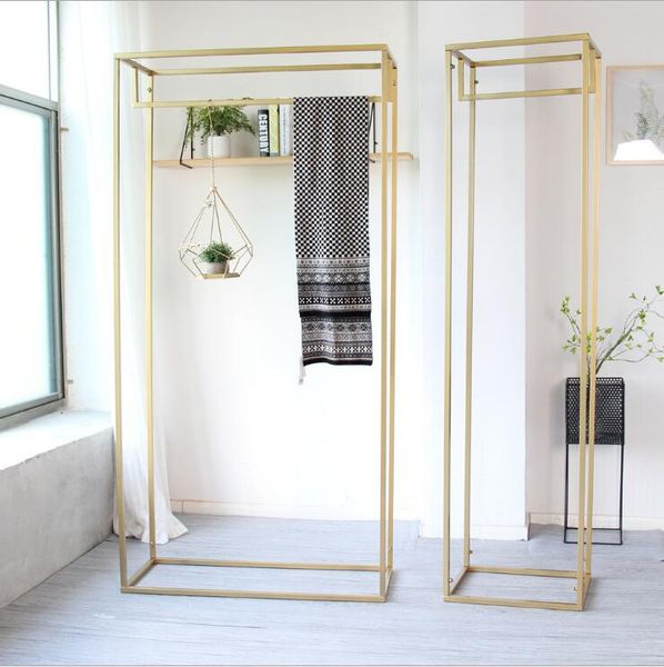 women's clothing shelf metal hanger commercial furniture display rack in cloth shop golden racks of shopping mall landing
women's clothing shelf metal hanger commercial furniture display rack in cloth shop golden racks of shopping mall landing