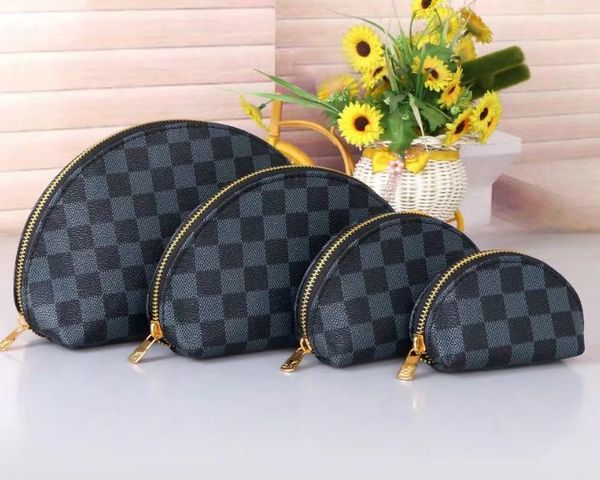 2020 new 4pcs/set women cosmetic bags famous makeup bag designer travel pouch make up bag ladies cluch purses toiletry bag vip gift 3016 
2020 new 4pcs/set women cosmetic bags famous makeup bag designer travel pouch make up bag ladies cluch purses toiletry bag vip gift 3016