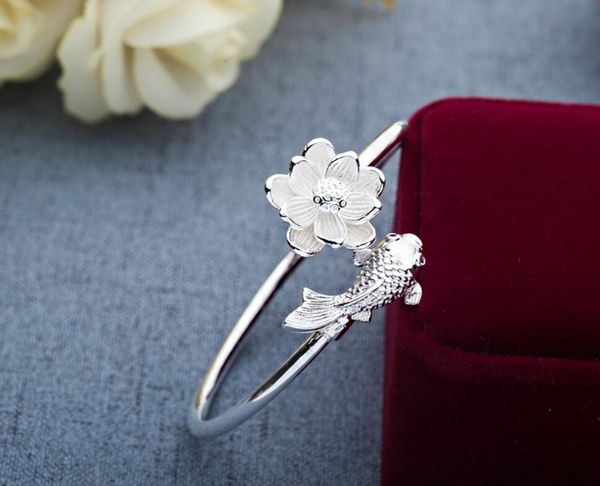 wholesale- new bracelet artistic fresh carved jewelry new creative fashion style lotus and fish decorative bracelet, Golden;silver
wholesale- new bracelet artistic fresh carved jewelry new creative fashion style lotus and fish decorative bracelet, Golden;silver