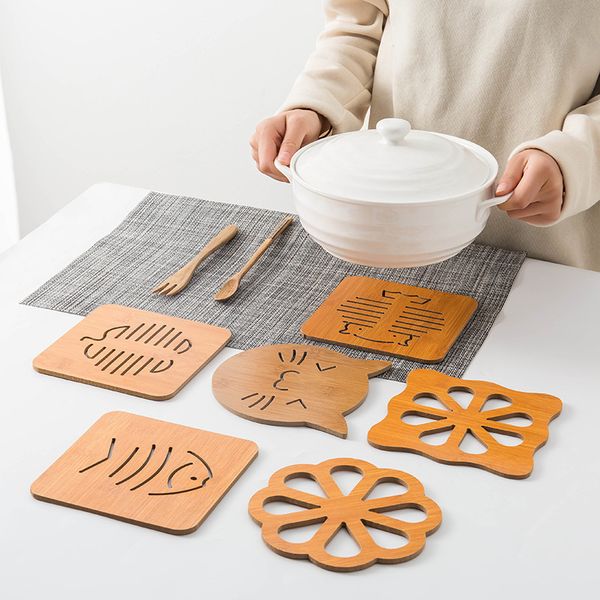 new wooden environmentally friendly hollow table mat coaster kitchen thickened anti-scald heat insulation non-slip pot mat
new wooden environmentally friendly hollow table mat coaster kitchen thickened anti-scald heat insulation non-slip pot mat