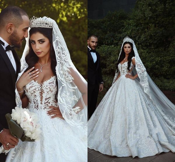 gorgeous arabic v-neck sleeveless beaded a line bridal gowns 2019 long lace appliques wedding dress with overskirt engagement gowns, White
gorgeous arabic v-neck sleeveless beaded a line bridal gowns 2019 long lace appliques wedding dress with overskirt engagement gowns, White