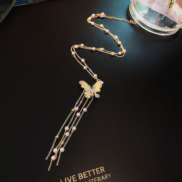 new design high-quality butterfly tassel pearl butterfly necklace for woman shiny chain clavicle long holiday necklace female, Silver
new design high-quality butterfly tassel pearl butterfly necklace for woman shiny chain clavicle long holiday necklace female, Silver