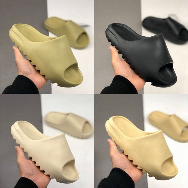 new kanye west slide slippers men women bone desert sand resin black mens slides designer shoes fashion sandal beach sandals size 36-45
new kanye west slide slippers men women bone desert sand resin black mens slides designer shoes fashion sandal beach sandals size 36-45