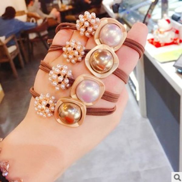 60pcs/lot diy simple multi pearl alloy rubber bands double-deck bowknot elasticity hair rings styling tools accessories ha645, Brown
60pcs/lot diy simple multi pearl alloy rubber bands double-deck bowknot elasticity hair rings styling tools accessories ha645, Brown