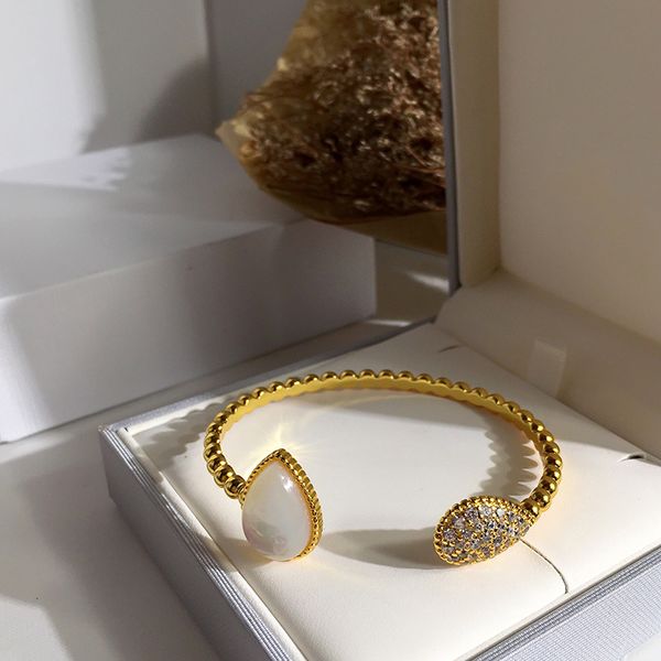 wholesale- fashion new brand titanium steel gold bracelet water drops agate opening bracelet for women charm jewelry, Golden;silver
wholesale- fashion new brand titanium steel gold bracelet water drops agate opening bracelet for women charm jewelry, Golden;silver