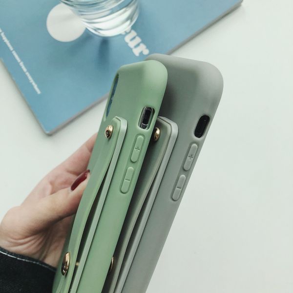 simple matte candy wrist strap hand band silicone case for iphone 11 pro 6 6s 7 8 plus x xr xs max back phone stand ring protect cover
simple matte candy wrist strap hand band silicone case for iphone 11 pro 6 6s 7 8 plus x xr xs max back phone stand ring protect cover
