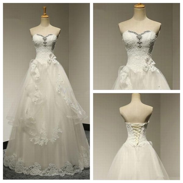 2019 chic tiered lace appliques plus size wedding dress sleeveless floor length beaded satin wedding dress with bow and lace up back, White
2019 chic tiered lace appliques plus size wedding dress sleeveless floor length beaded satin wedding dress with bow and lace up back, White