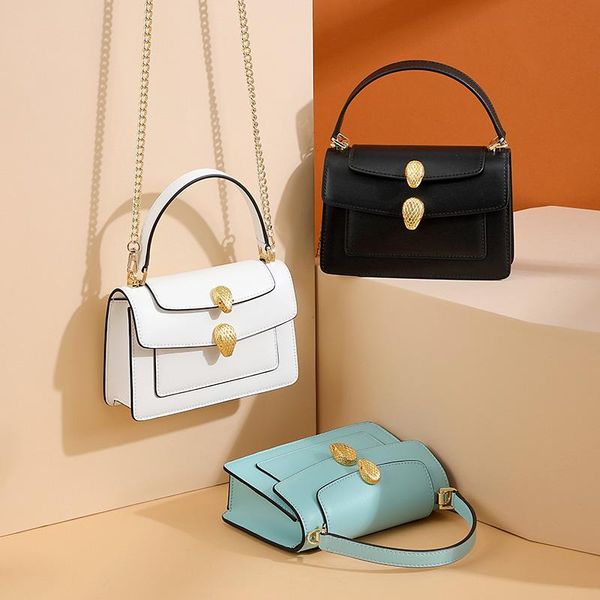 new personality snake head shoulder messenger bag wild cowhide chain portable small square bag trend hy1084
new personality snake head shoulder messenger bag wild cowhide chain portable small square bag trend hy1084