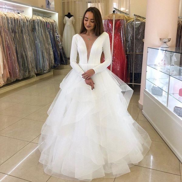 white long sleeves wedding dresses deep v neck sheer neck tiered skirt a line beach bridal dress back pearls wedding gowns
white long sleeves wedding dresses deep v neck sheer neck tiered skirt a line beach bridal dress back pearls wedding gowns