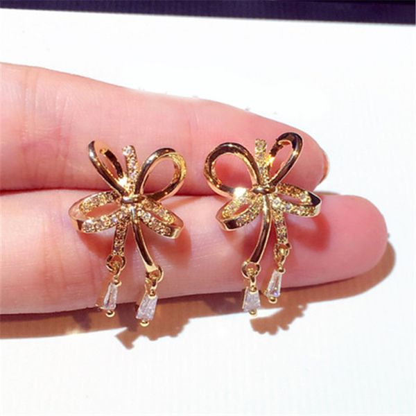 new fashion korean stud earrings gold color rhinestone bowknot earrings for women jewelry, Golden;silver 
new fashion korean stud earrings gold color rhinestone bowknot earrings for women jewelry, Golden;silver