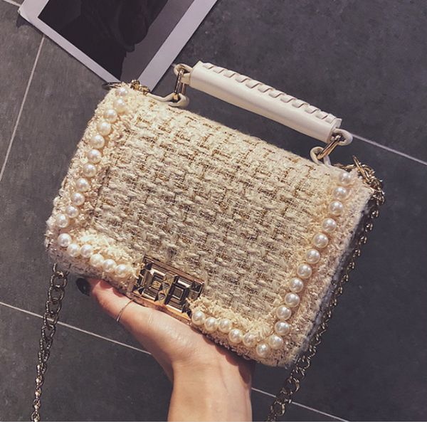 designer new women chain simple messenger bag pearl trend large capacity shoulder bag lady winter woolen handbag//85
designer new women chain simple messenger bag pearl trend large capacity shoulder bag lady winter woolen handbag//85