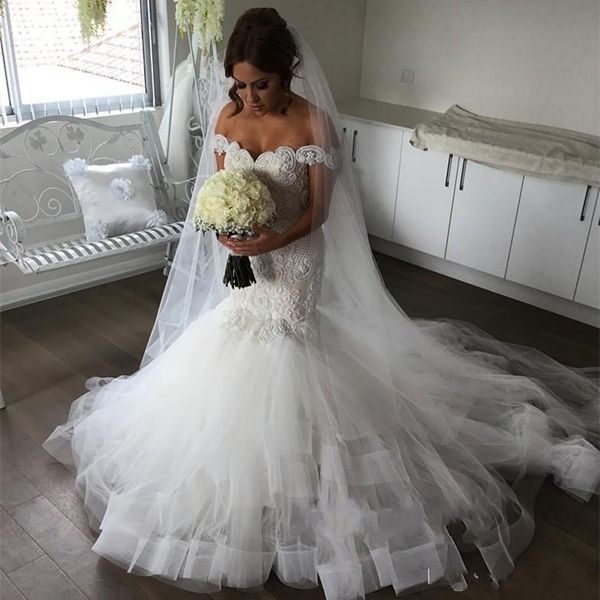 Off Shoulder Mermaid Wedding Dresses Long 3D Lace Appliques Low Back Sexy Wedding Dress Tulle Tiered Skirt Country Bridal Gowns
Off Shoulder Mermaid Wedding Dresses Long 3D Lace Appliques Low Back Sexy Wedding Dress Tulle Tiered Skirt Country Bridal Gowns