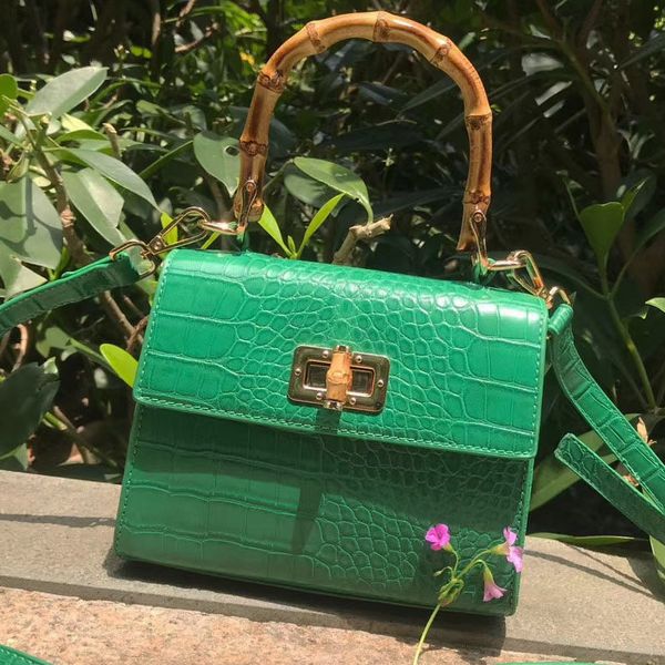 new update green crocodile leather tote bags bamboo handle fashion crossbody bag crocodile ladies clutch bag for summer
new update green crocodile leather tote bags bamboo handle fashion crossbody bag crocodile ladies clutch bag for summer