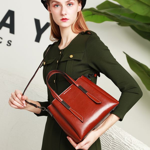 new european and american women's bags leather handbags simple messenger shoulder bag korean fashion leather tote bag 9072
new european and american women's bags leather handbags simple messenger shoulder bag korean fashion leather tote bag 9072