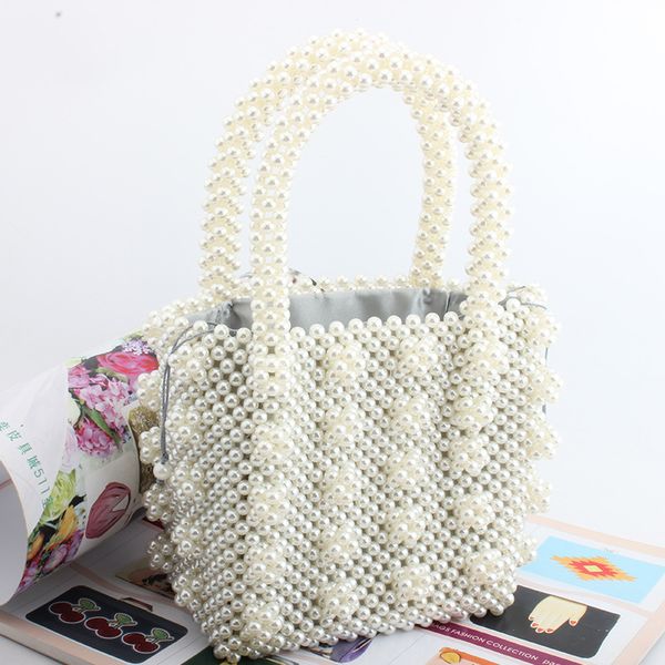women fashion pearls bag beaded box bucket totes bag women party elegant handbag luxury black white yellow pink fast shipment
women fashion pearls bag beaded box bucket totes bag women party elegant handbag luxury black white yellow pink fast shipment