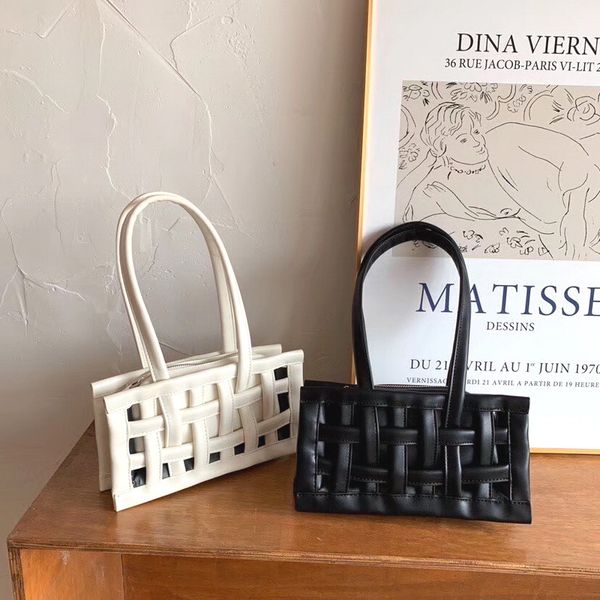 new style bag fashion cool retro weaving armpit hand shoulder hollow out women's bag
new style bag fashion cool retro weaving armpit hand shoulder hollow out women's bag