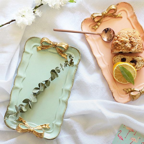 european style bow cake storage trays makeup organizer dessert plate square decor tray kitchen storage trays 12x20cm
european style bow cake storage trays makeup organizer dessert plate square decor tray kitchen storage trays 12x20cm