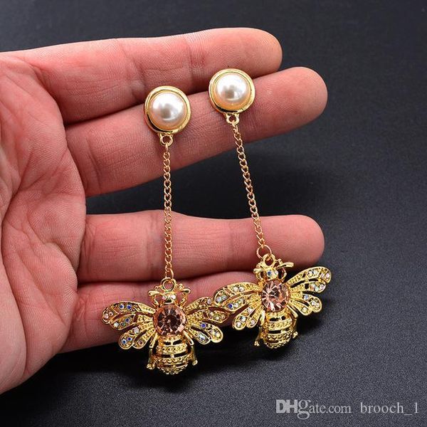 оптовая дизайнерские серьги стержня женщины cute bee dangel кисточкой кулон золото bee серьги шарма партии ювелирных изделий подарки для жен, Golden;silver
оптовая дизайнерские серьги стержня женщины cute bee dangel кисточкой кулон золото bee серьги шарма партии ювелирных изделий подарки для жен, Golden;silver