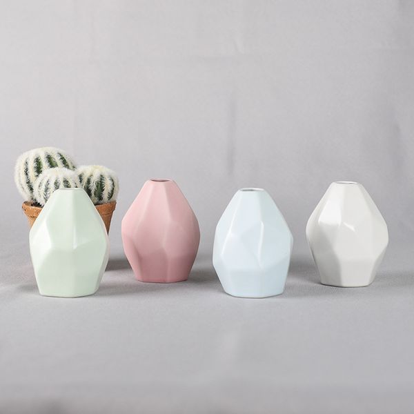 creative tablevases ceramic polyhedron shaped flower pots mini vase for home decor 9cm height 2lm e1
creative tablevases ceramic polyhedron shaped flower pots mini vase for home decor 9cm height 2lm e1
