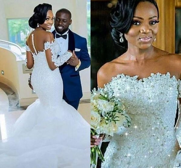 2020 african off shoulder mermaid wedding dresses sheer neck lace appliques beads crystal button back long sleeves tulle bridal gowns, White
2020 african off shoulder mermaid wedding dresses sheer neck lace appliques beads crystal button back long sleeves tulle bridal gowns, White