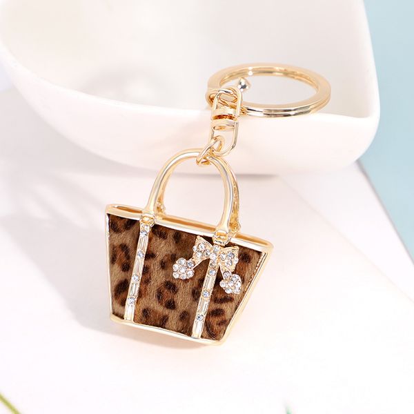 fashion new creative leopard small bag shape key chain exquisite car pendant key ring gift female, Silver
fashion new creative leopard small bag shape key chain exquisite car pendant key ring gift female, Silver