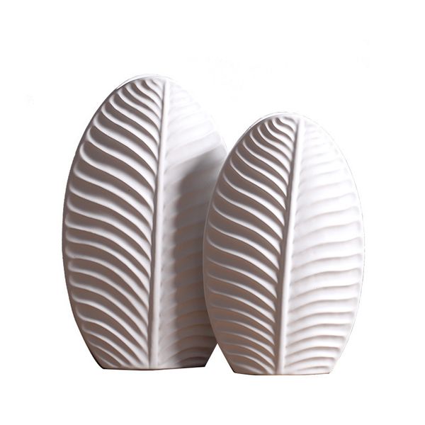 modern leaf shape flower vase nordic decorative white ceramic vase creative home wedding restaurant decoration crafts accessories
modern leaf shape flower vase nordic decorative white ceramic vase creative home wedding restaurant decoration crafts accessories