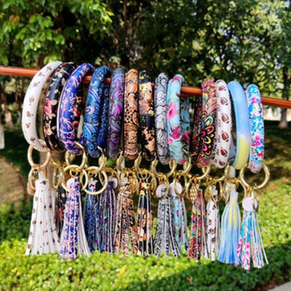 leather bracelet key chain pu wrist key ring tassel pendant wristbands sports keychain bracelets bangle round rings party favor zza1445
leather bracelet key chain pu wrist key ring tassel pendant wristbands sports keychain bracelets bangle round rings party favor zza1445