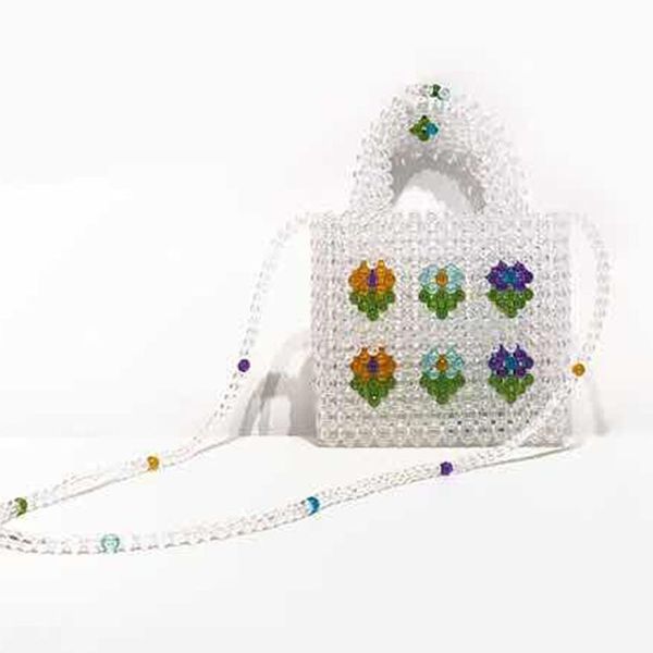 creative small flower pearl bag hand-beaded knitting bag cross-hand dual use ins super fire
creative small flower pearl bag hand-beaded knitting bag cross-hand dual use ins super fire