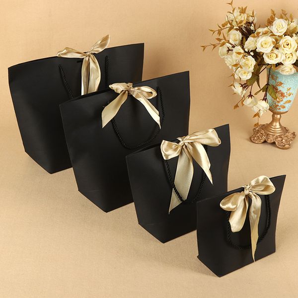 5pcs/pack favor bow ribbon gift bag recyclable diy paper bags for clothes wedding birthday party with handles celebration decor
5pcs/pack favor bow ribbon gift bag recyclable diy paper bags for clothes wedding birthday party with handles celebration decor