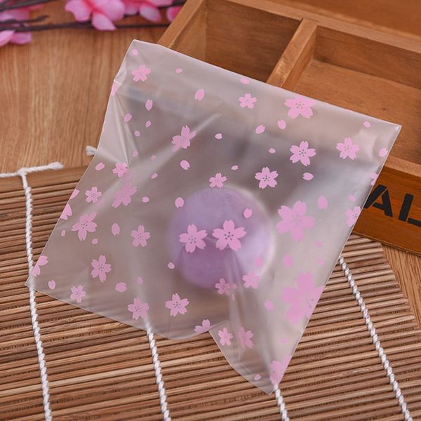 100pcs pink cherry blossoms cookie candy bag self-adhesive gift bag plastic for candy snack party supplies
100pcs pink cherry blossoms cookie candy bag self-adhesive gift bag plastic for candy snack party supplies