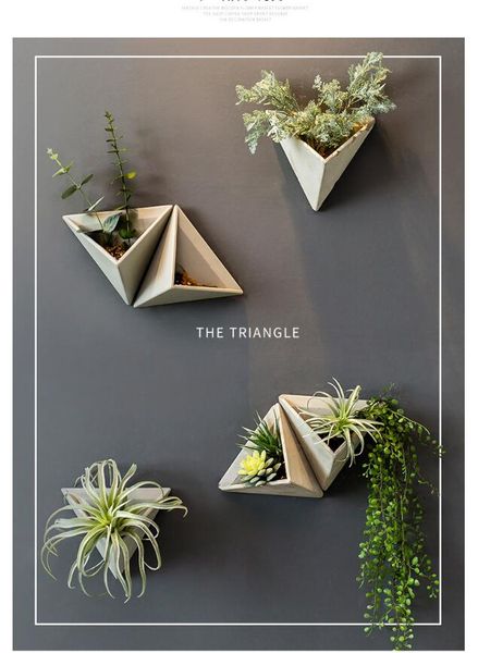triangular flower apparatus retro american cement wall hanging simulated flower pot wall hanging of polyporous plants in restaurant
triangular flower apparatus retro american cement wall hanging simulated flower pot wall hanging of polyporous plants in restaurant