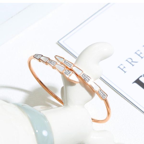 tredy snake women open with designer charms crystal shell bracelet stainless steel rose gold lady elegant band 946, Black
tredy snake women open with designer charms crystal shell bracelet stainless steel rose gold lady elegant band 946, Black